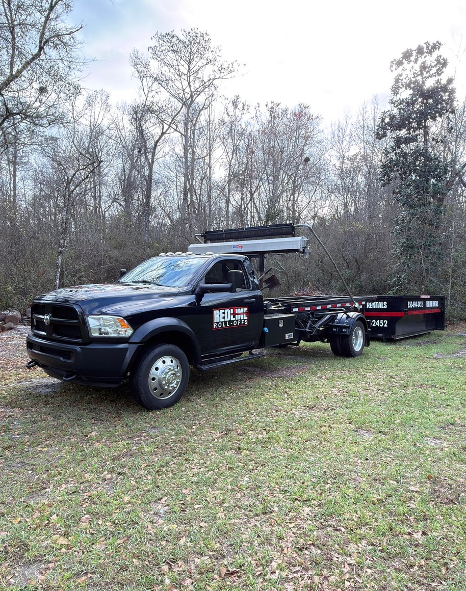 Red Line Rentals roll-off dumpster delivered to a Crawfordville, FL home